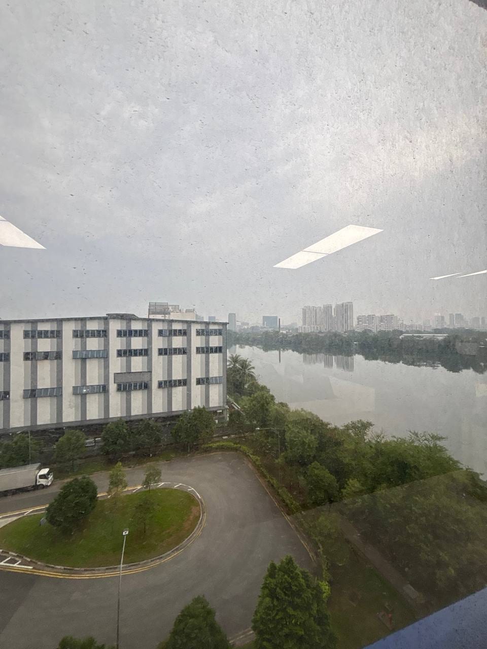 View from the office over the water to a neighbouring industrial building